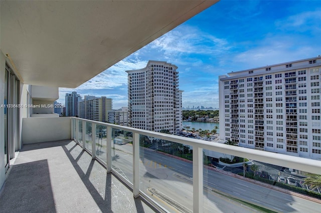 balcony featuring a water view