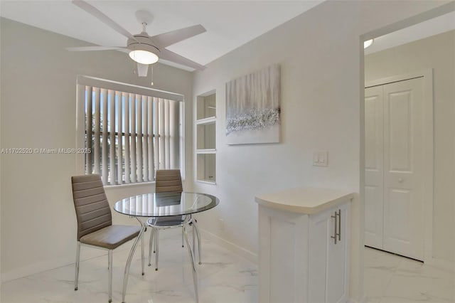 dining area featuring ceiling fan