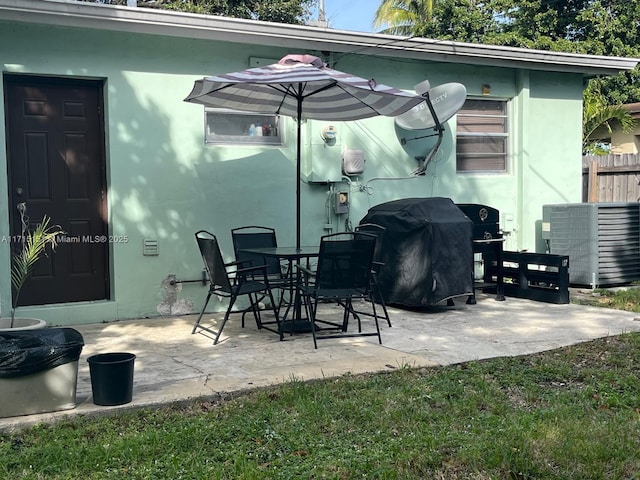 view of patio / terrace with cooling unit and grilling area