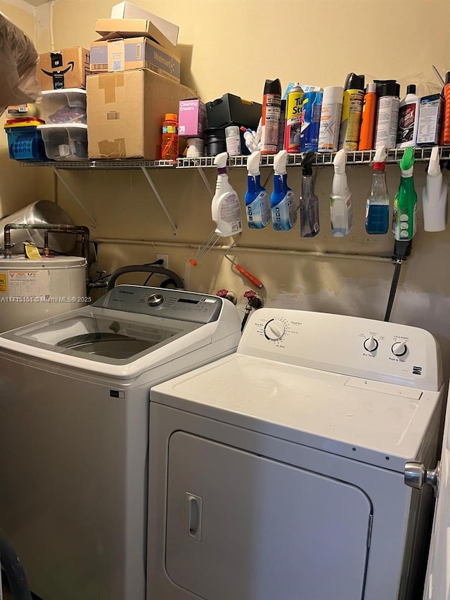 laundry area with independent washer and dryer