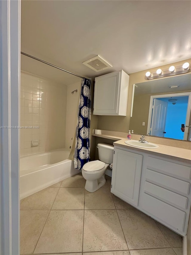 full bathroom featuring vanity, visible vents, shower / bath combo, tile patterned floors, and toilet