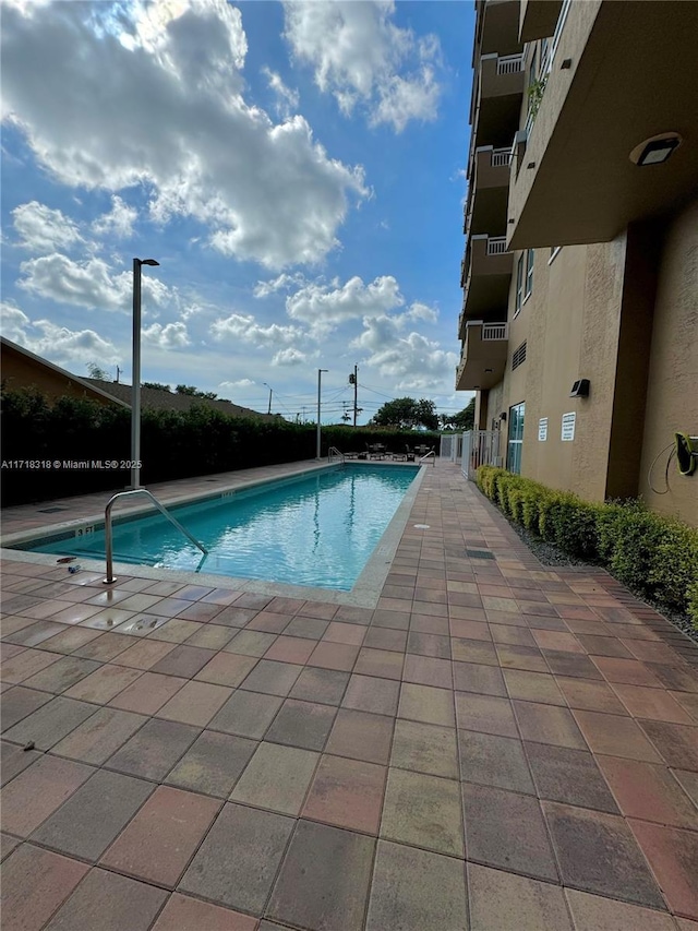 pool featuring a patio