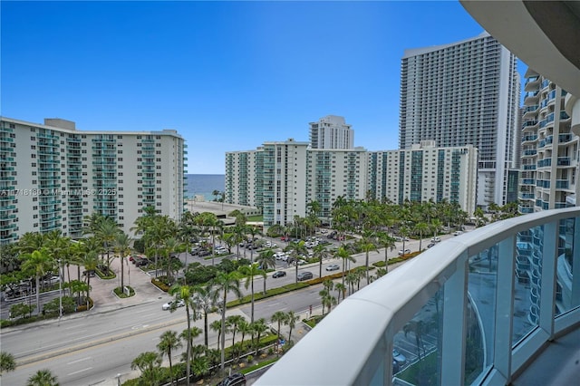 balcony featuring a water view