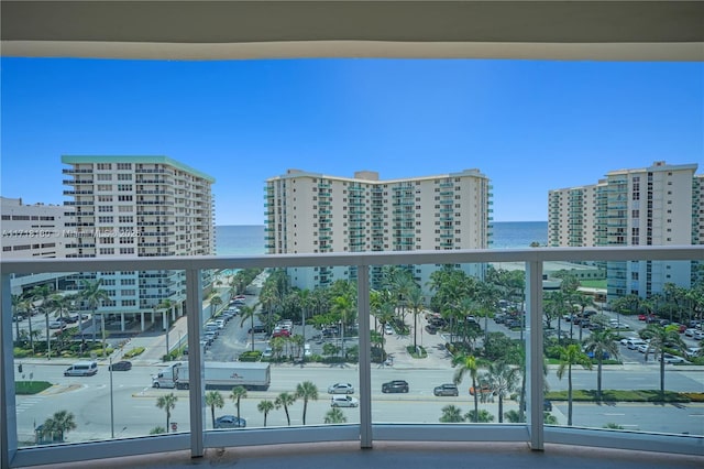 balcony featuring a water view