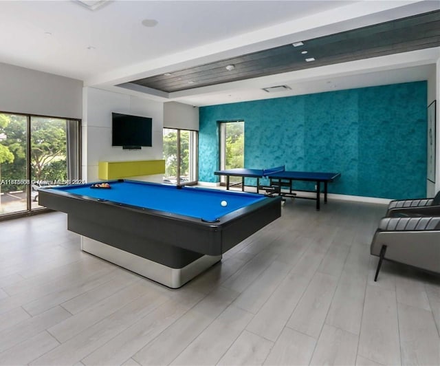 playroom with light hardwood / wood-style flooring and billiards