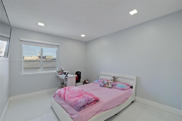 bedroom with a textured ceiling