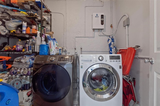 laundry area featuring washing machine and dryer