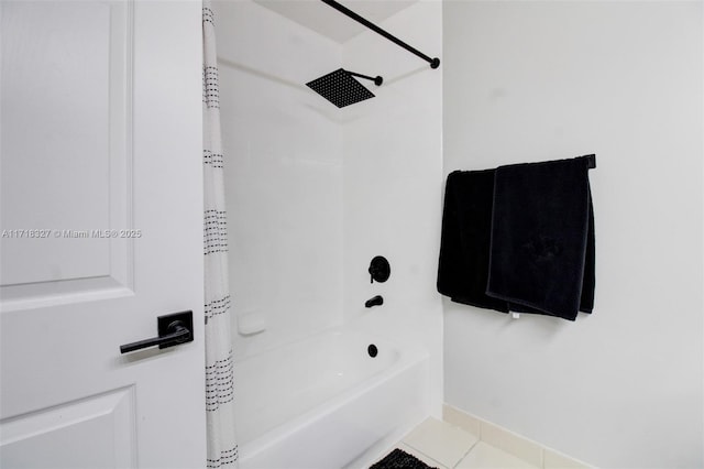 bathroom featuring tile patterned flooring and shower / bath combination with curtain