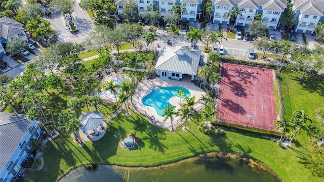 birds eye view of property with a water view