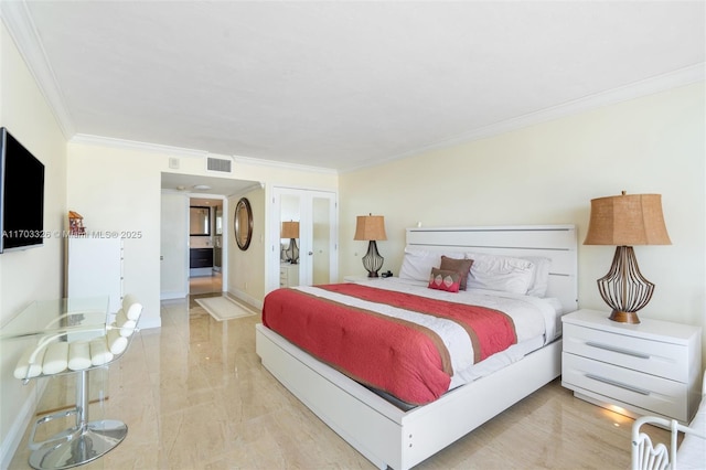 bedroom with crown molding