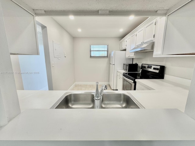 kitchen with white cabinets, sink, and stainless steel appliances