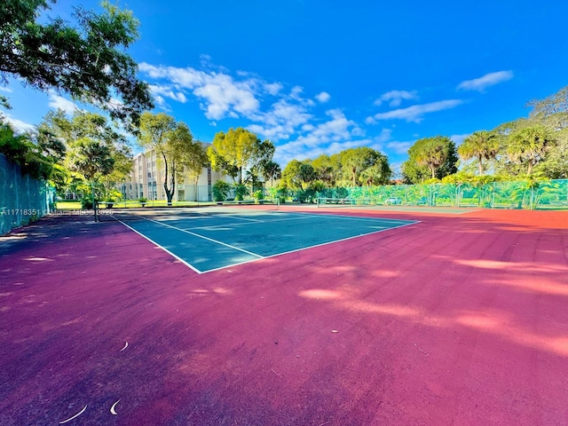 view of sport court featuring basketball hoop