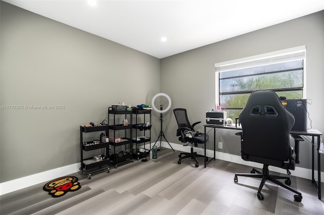 home office featuring light hardwood / wood-style floors