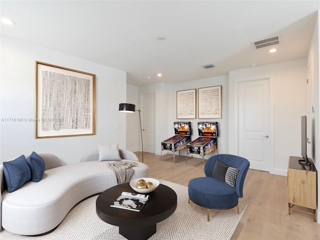 empty room with light hardwood / wood-style flooring