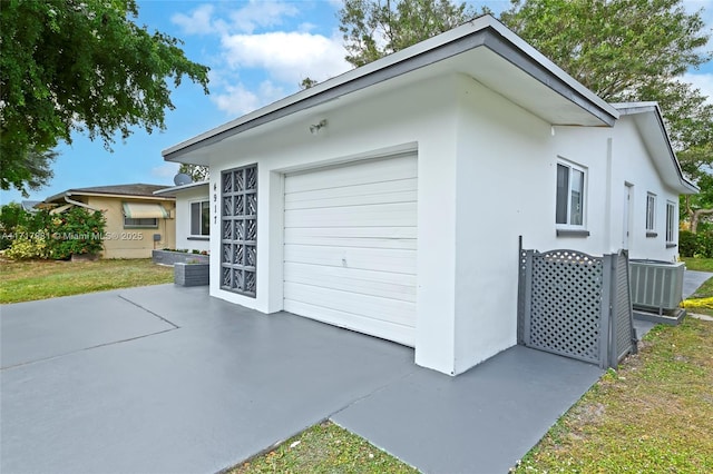 garage with central AC unit