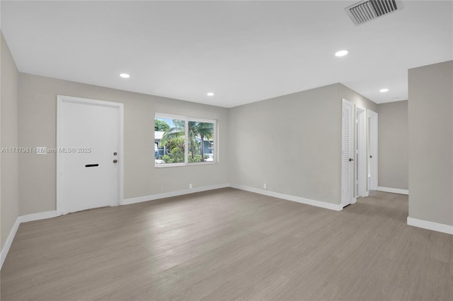 empty room featuring light wood-type flooring