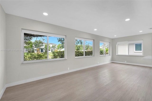 empty room featuring light hardwood / wood-style floors