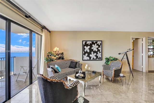 living room featuring a water view