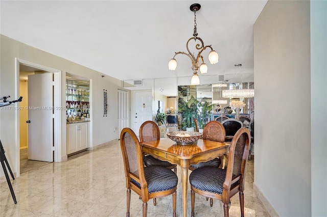 dining room with an inviting chandelier