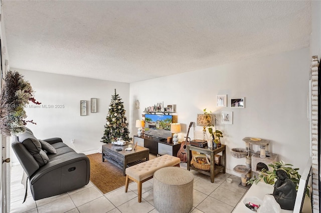 living room with light tile patterned floors and a textured ceiling