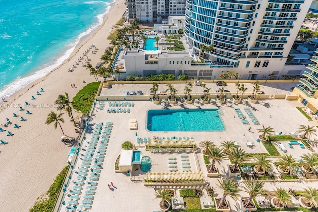 aerial view featuring a water view and a view of the beach