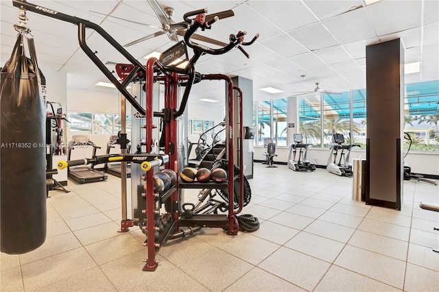 exercise room with ceiling fan