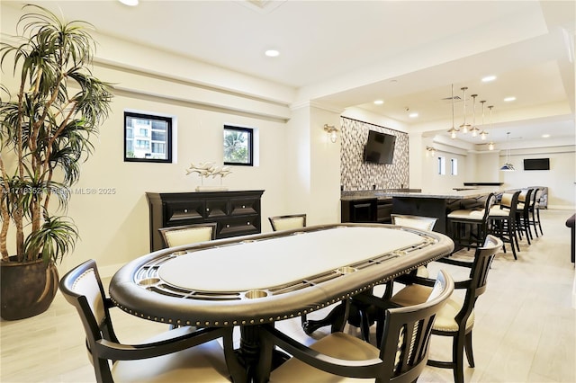 game room featuring light hardwood / wood-style floors