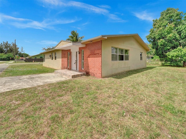 exterior space with a front yard