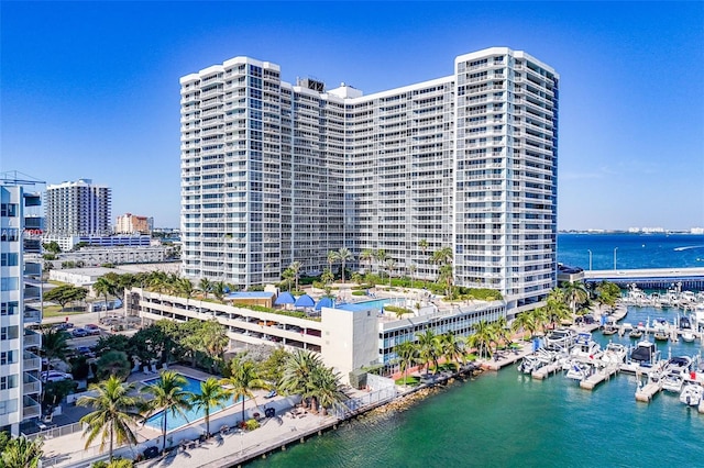 view of building exterior with a water view