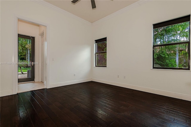 spare room featuring wood-type flooring, plenty of natural light, ceiling fan, and crown molding