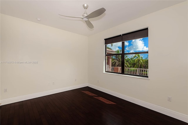 spare room with ceiling fan and wood-type flooring