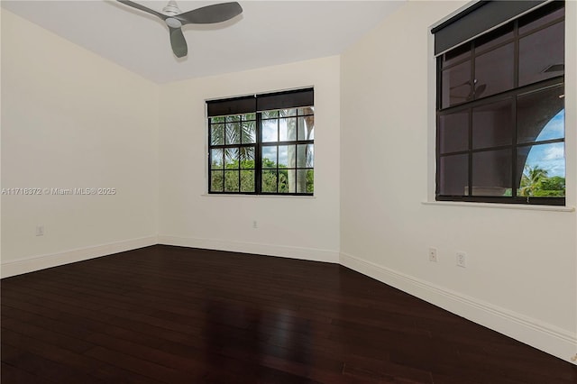 spare room with ceiling fan and wood-type flooring