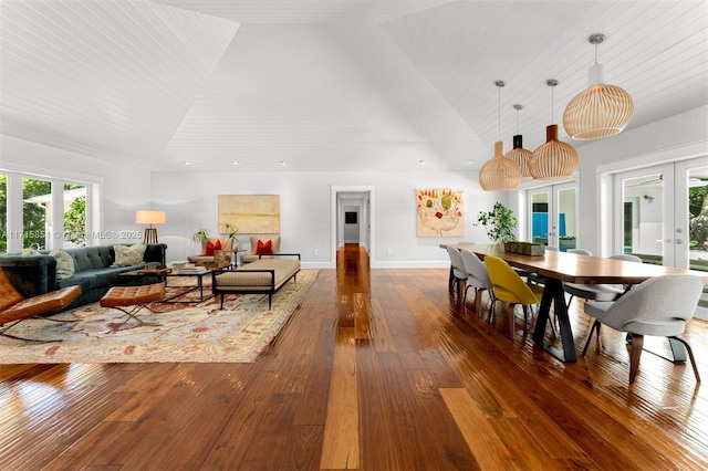 dining space featuring french doors, wooden ceiling, high vaulted ceiling, and dark wood-type flooring