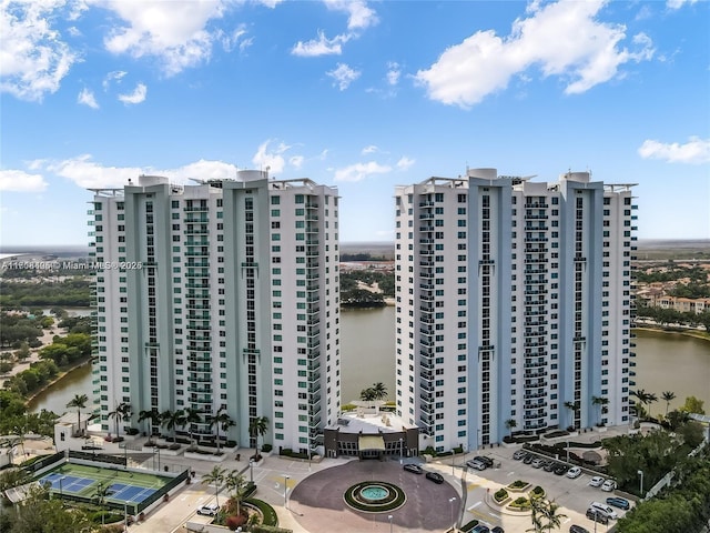 view of property with a water view