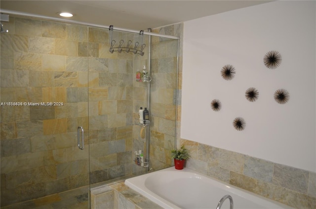 bathroom with independent shower and bath