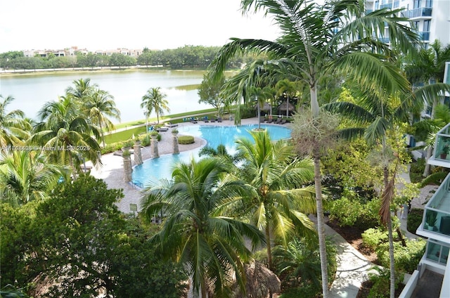 view of pool with a water view