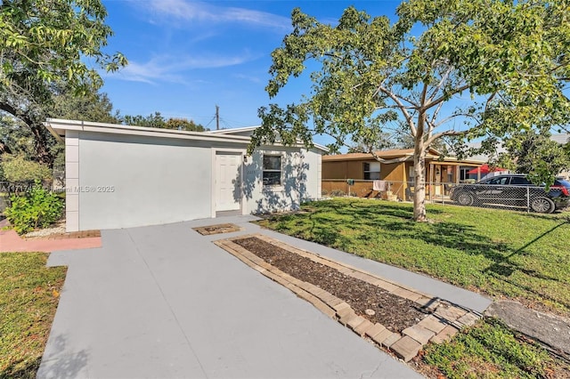 ranch-style home featuring a front yard