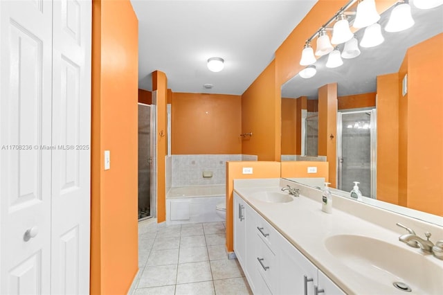 full bathroom featuring tile patterned floors, vanity, plus walk in shower, and toilet