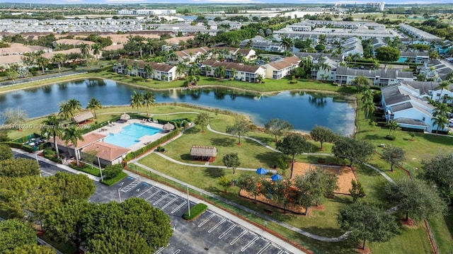 birds eye view of property featuring a water view