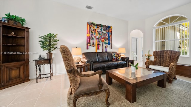 living room with light tile patterned floors