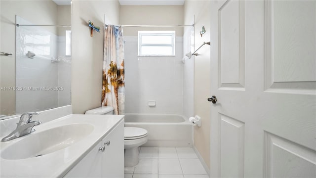 full bathroom featuring vanity, toilet, tile patterned flooring, and shower / bath combo