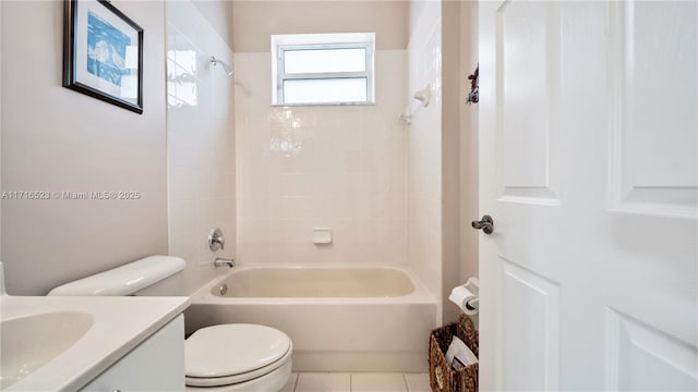 full bathroom with tiled shower / bath, vanity, toilet, and tile patterned flooring