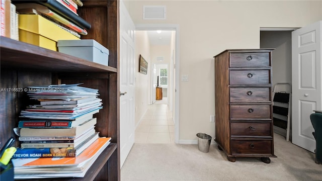 interior space featuring light colored carpet