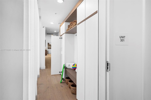 hallway featuring light hardwood / wood-style flooring