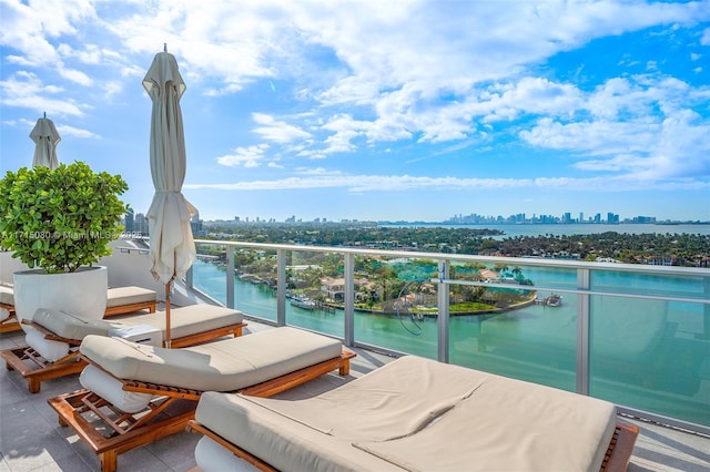 balcony featuring a water view