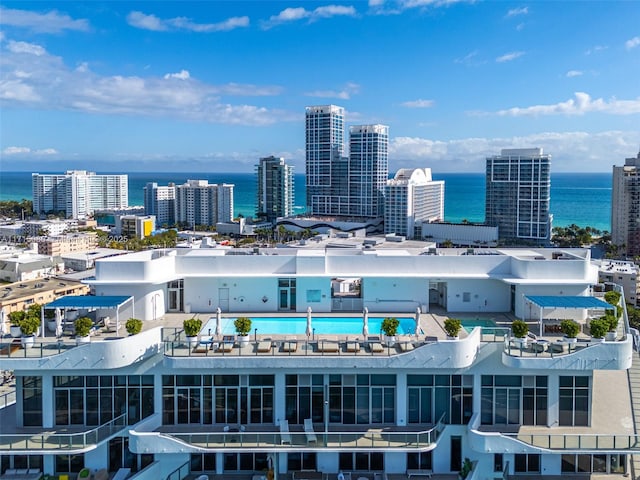 property's view of city featuring a water view