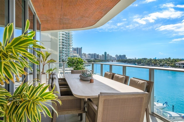 balcony featuring a water view