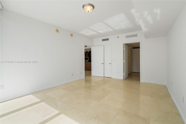 unfurnished bedroom featuring a closet