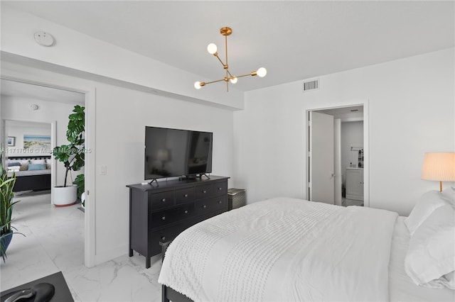 bedroom featuring a notable chandelier