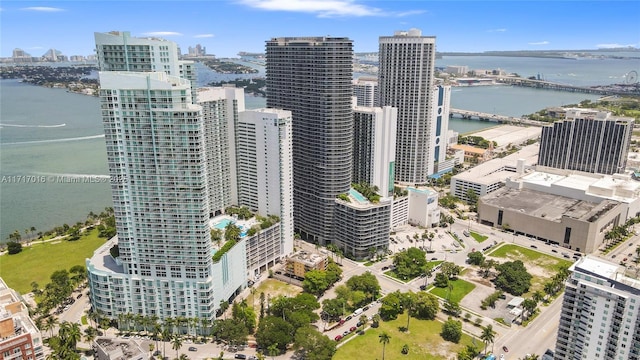 birds eye view of property with a water view